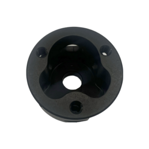 A 10° Angled Steering Wheel Adapter, characterized by its round, black metal design with a central hole and three supporting holes around the perimeter.