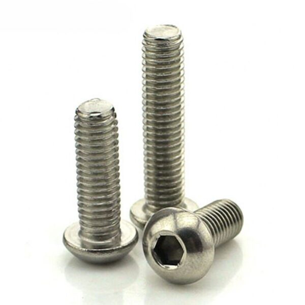 Three silver button head cap screws stand on a white background, with two upright and one lying down in front.