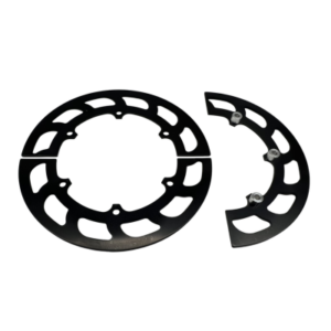 A split round metal disc with a circular pattern of cutouts, featuring the 6-Spoke Sprocket Hub Gear Guards 8-1/2" in Black Anodized, shown in two attached halves.