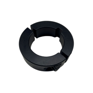 An Axle Locking Collar 1-1/4" Black Anodized with a split design and tightening mechanism.