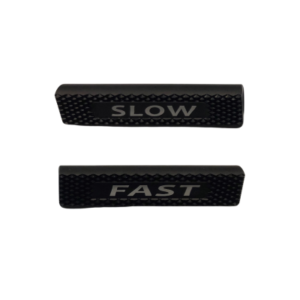 The Pedal Grip Set - 1/2" FAST/SLOW includes two black textured grips, each labeled with white text to indicate different speed settings: "SLOW" and "FAST.