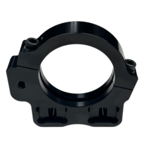 The "Rear Axle Cassette Left Side - Pursuit & Xpect" is a black, circular metal clamp with screws and mounting holes, designed for securing cylindrical objects or components.