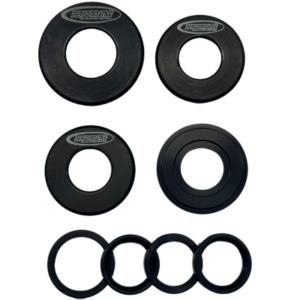 Image of six black metal bearing shields and four black rubber O-rings from the "Front Wheel Hub Bearing Shields Set - 5/8" (3) & 3/4" (1)" arranged in a neat pattern on a white background.