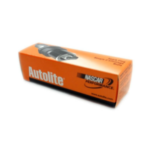 Rectangular orange box labeled "Autolite NASCAR Performance" containing an Autolite Spark Plug for Flathead Motors.