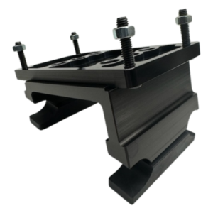 A black, rectangular metal bracket with four protruding bolts and nuts.